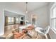 Dining room featuring hardwood floors, view of living room and access to kitchen at 222 Bishop Ne Dr, Marietta, GA 30060