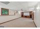 Finished basement featuring a movie theater screen and built-in wood cabinets at 2110 Waterloo Cir, Lawrenceville, GA 30043