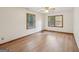Bedroom with hardwood floors and two large windows providing ample natural light at 2110 Waterloo Cir, Lawrenceville, GA 30043
