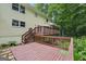 View of expansive wooden deck with stairs leading to the backyard at 2110 Waterloo Cir, Lawrenceville, GA 30043
