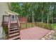 Open deck area with brown wood and view of back yard at 2110 Waterloo Cir, Lawrenceville, GA 30043