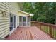 Deck features a screen porch, wood railing and stairs at 2110 Waterloo Cir, Lawrenceville, GA 30043