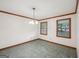 Formal dining room with tile floor and natural light at 2110 Waterloo Cir, Lawrenceville, GA 30043