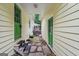 Exterior view of the home showcasing access between buildings and stone pathway at 2110 Waterloo Cir, Lawrenceville, GA 30043