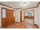 Welcoming foyer with wood floors, front door, and view to open living space at 2110 Waterloo Cir, Lawrenceville, GA 30043