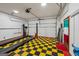 Expansive garage with a car lift, offering ample space for vehicle storage and maintenance at 2110 Waterloo Cir, Lawrenceville, GA 30043