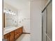 Bright bathroom features a double vanity sink and a glass shower enclosure at 2110 Waterloo Cir, Lawrenceville, GA 30043