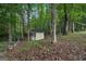 Storage shed located on a leafy lot and among mature trees at 2110 Waterloo Cir, Lawrenceville, GA 30043