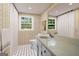 Charming bathroom with patterned wallpaper and modern vanity at 3332 St John Dr, East Point, GA 30344