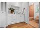 Bathroom featuring a single sink vanity and combination tub and shower at 3332 St John Dr, East Point, GA 30344