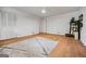 Bedroom with hardwood floors, ceiling fan, and plenty of natural light at 3332 St John Dr, East Point, GA 30344