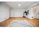 Bedroom features hardwood floors, ceiling fan, and ensuite bathroom at 3332 St John Dr, East Point, GA 30344