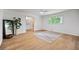 Spacious bedroom with hardwood floors, large windows, and ensuite bathroom at 3332 St John Dr, East Point, GA 30344