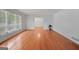 Spacious living room with gleaming hardwood floors and large windows at 3332 St John Dr, East Point, GA 30344