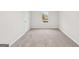 Bedroom with plush carpet, a window, and a door at 3614 Squires Park Ln, Loganville, GA 30052