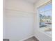 Walk-in closet with a window and metal shelving at 3614 Squires Park Ln, Loganville, GA 30052