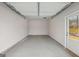 New garage with door to the exterior at 3614 Squires Park Ln, Loganville, GA 30052