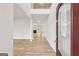 Spacious foyer with hardwood floors and high ceilings, leading into the open-concept living area at 3623 Squires Park Ln, Loganville, GA 30052