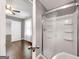 Bright bathroom showcasing a glass-enclosed shower and access to the bedroom at 644 Albert Nw St, Atlanta, GA 30318