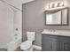 Updated bathroom featuring a subway tile shower over tub and modern vanity at 644 Albert Nw St, Atlanta, GA 30318
