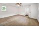 Bedroom with window featuring neutral carpet and ceiling fan at 644 Albert Nw St, Atlanta, GA 30318