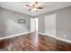 Spacious bedroom with hardwood flooring, modern paint, and a double door closet at 644 Albert Nw St, Atlanta, GA 30318