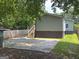 Exterior with wooden stairs and a concrete parking area at 644 Albert Nw St, Atlanta, GA 30318