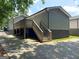 Exterior with wooden deck and stairs to the parking area at 644 Albert Nw St, Atlanta, GA 30318