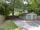 View of backyard, including detached garage and a driveway at 644 Albert Nw St, Atlanta, GA 30318
