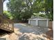 Detached two car garage with a driveway and steps to backyard deck at 644 Albert Nw St, Atlanta, GA 30318