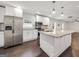 Bright, open kitchen with granite countertops, stainless steel appliances and a large center island at 644 Albert Nw St, Atlanta, GA 30318
