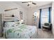 Comfortable bedroom with a decorative airplane theme and lots of natural light at 2 Silver Leaf Trl, Douglasville, GA 30134