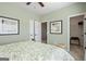 Bright bedroom with light green walls, a closet, and decor at 2 Silver Leaf Trl, Douglasville, GA 30134