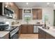 Bright kitchen with stainless steel appliances, white subway tile and a large sink at 2 Silver Leaf Trl, Douglasville, GA 30134