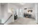 A carpeted loft is set up as a home office with a desk and decorative wall art at 2 Silver Leaf Trl, Douglasville, GA 30134