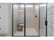 New shower with matte black shower head, black framed door, and a window for natural light at 2 Silver Leaf Trl, Douglasville, GA 30134