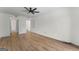Spacious bedroom features neutral walls, wood-look flooring and a ceiling fan at 1280 W Peachtreestreetsuffix=Street Nw # 808, Atlanta, GA 30309
