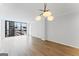 Bright living room featuring modern lighting, updated flooring, and expansive windows with cityscape views at 1280 W Peachtreestreetsuffix=Street Nw # 808, Atlanta, GA 30309