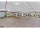 Well-lit parking garage with brick flooring and secure gated access at 1280 W Peachtreestreetsuffix=Street Nw # 808, Atlanta, GA 30309