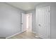 This bedroom features closet space and modern finishes at 1349 Heather Cir, Riverdale, GA 30296