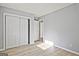 This bedroom offers wood-look floors and a large closet space at 1349 Heather Cir, Riverdale, GA 30296