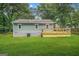 Backyard with deck and green grass at 1675 White Oak Way, Decatur, GA 30032
