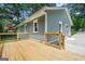 Exterior view of home featuring a deck and backyard at 1675 White Oak Way, Decatur, GA 30032
