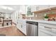Bright kitchen featuring white cabinets, quartz countertops, and stainless steel appliances at 1675 White Oak Way, Decatur, GA 30032
