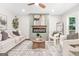 Comfortable living room featuring a fireplace, modern decor, and hardwood floors at 1675 White Oak Way, Decatur, GA 30032