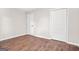 Room with vinyl floors, fresh paint, and a closet at 1675 White Oak Way, Decatur, GA 30032