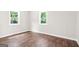 Unfurnished room with neutral paint, white trim, and vinyl flooring at 1675 White Oak Way, Decatur, GA 30032