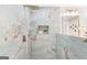 Beautiful shower with a rainfall shower head, accent wall tiles, and built-in niche at 1675 White Oak Way, Decatur, GA 30032