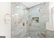 Beautiful shower with a rainfall shower head, accent wall tiles, and built-in niche at 1675 White Oak Way, Decatur, GA 30032