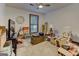 Spacious bedroom needing work, featuring a ceiling fan and natural light at 4920 Tremont Ne Dr, Marietta, GA 30066